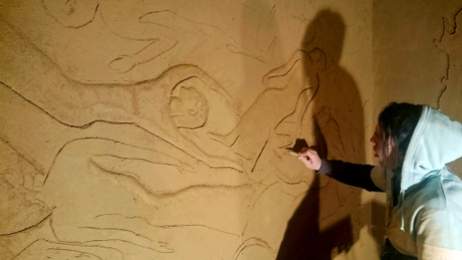 Guy Valentine carving clay wall at Hattusa Restaurant in Kent