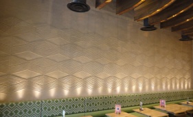 Anaglyptic clay textured wall, Nando's restaurant in Manchester